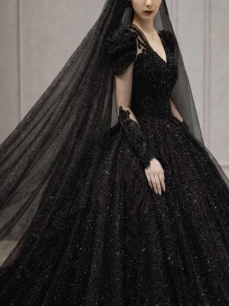 Prachtvolles schwarzes Glitzer-Brautkleid mit langen Ärmeln und passendem schwarzem Schleier – exklusive schwarze Brautkleider in der Schweiz.